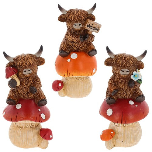 Small Highland Cow sitting on a mushroom