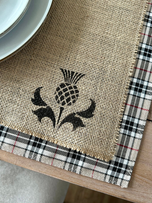 Neutral tartan placemats with thistle