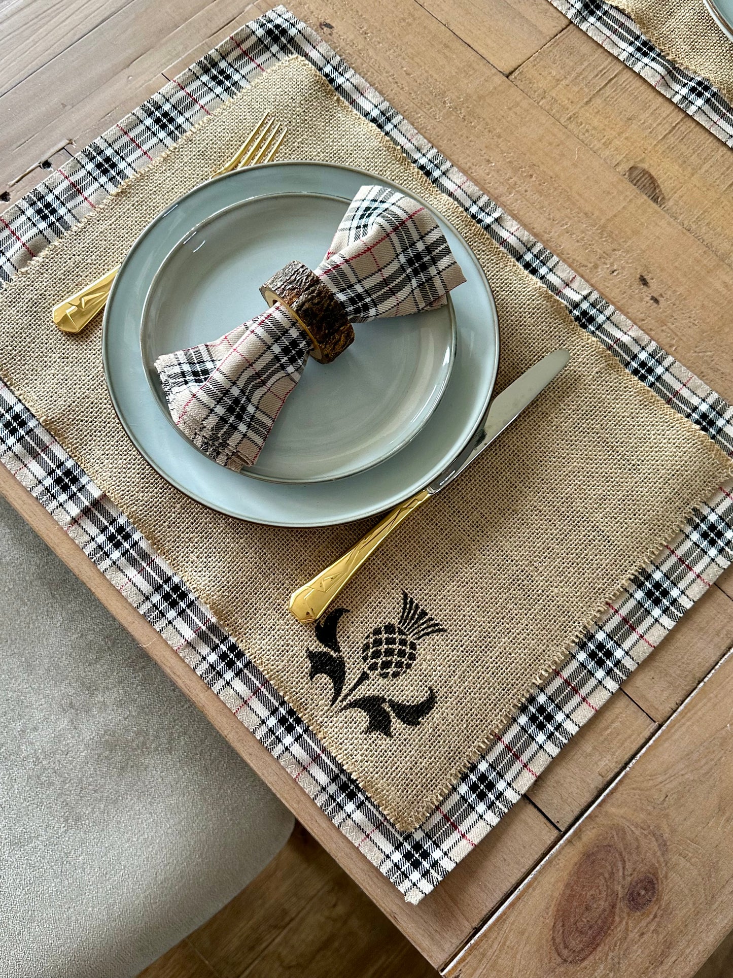 Neutral tartan placemats with thistle