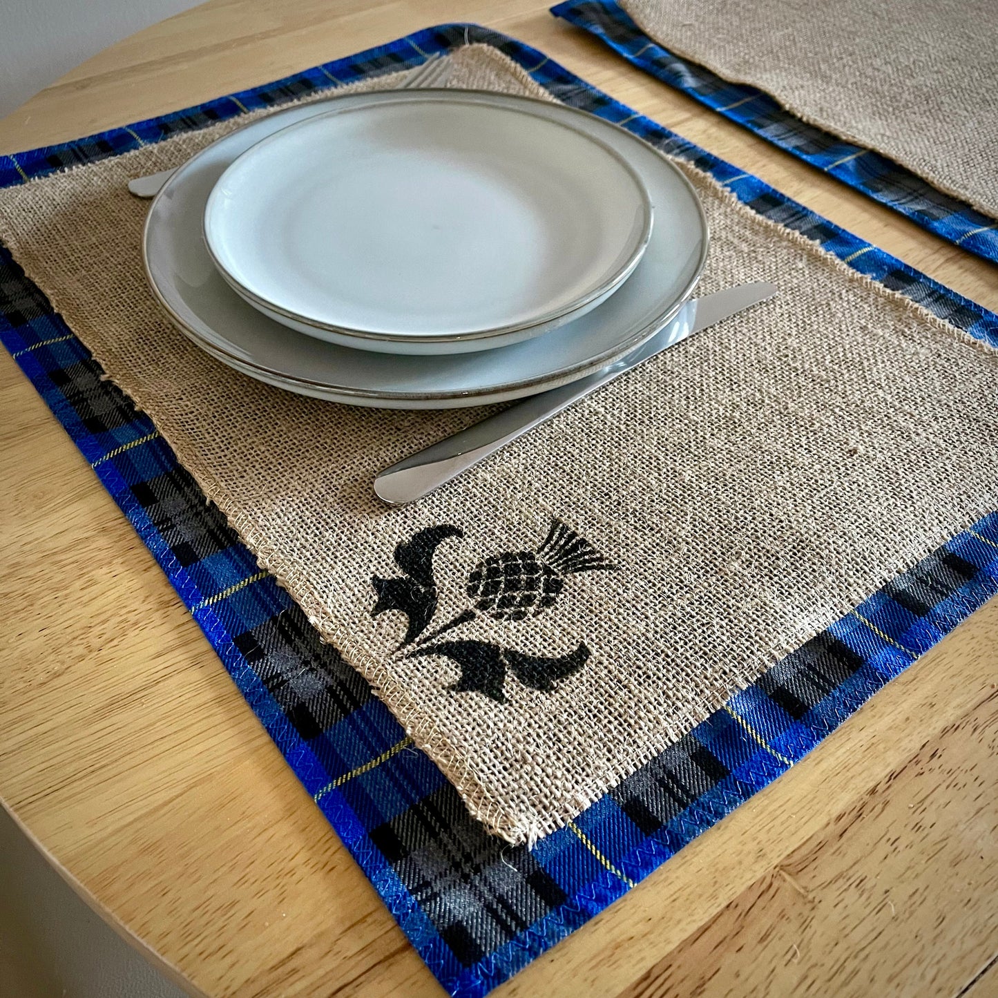 Blue tartan placemats with thistle