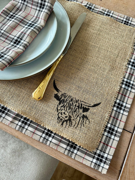 Neutral tartan placemats with highland cow