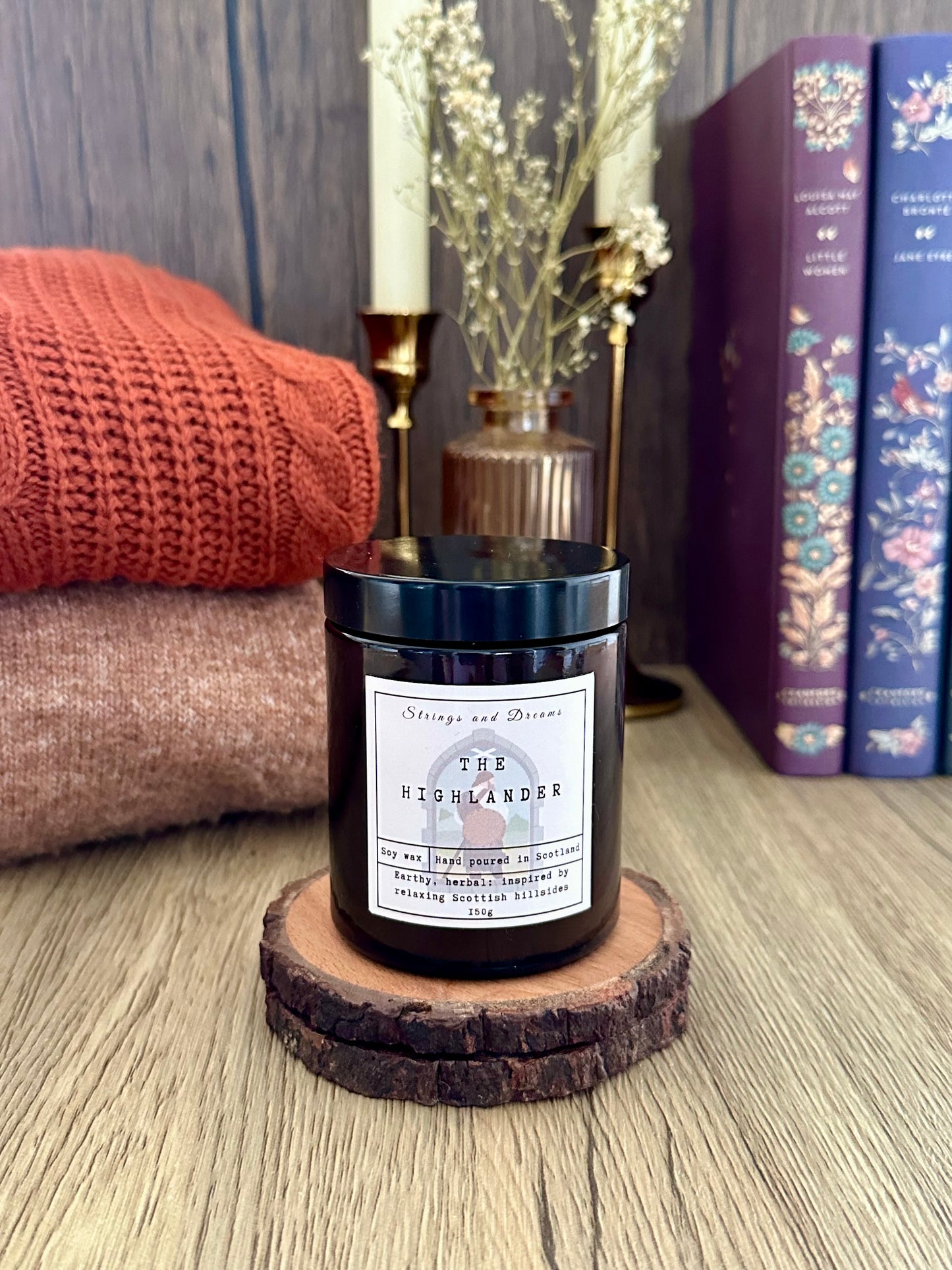 The Highlander digital story scented candle