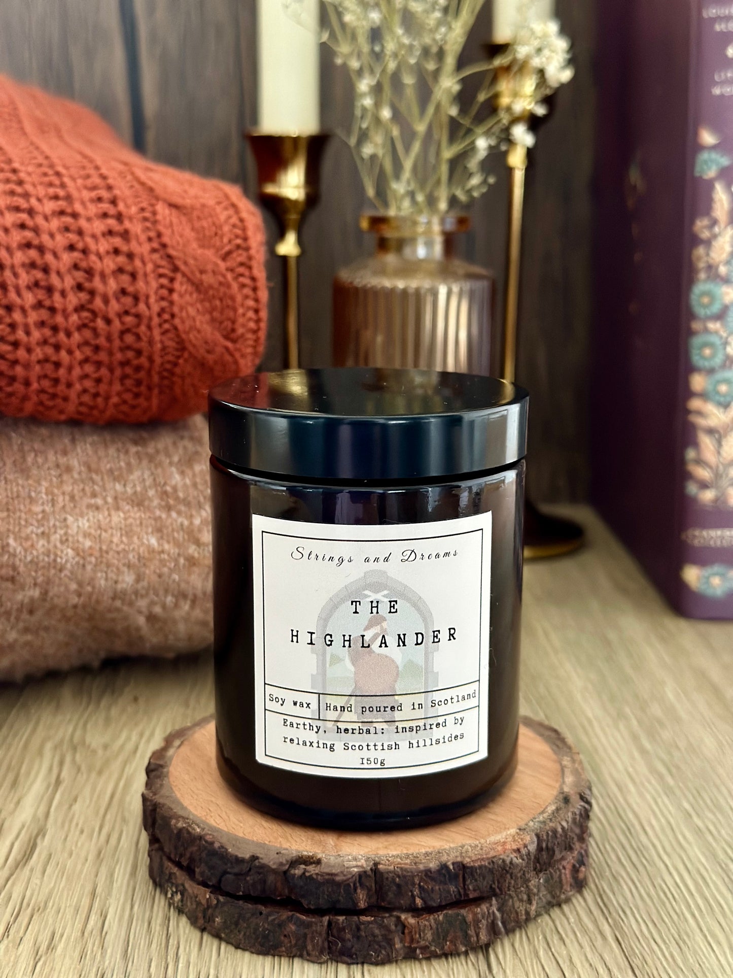 The Highlander digital story scented candle