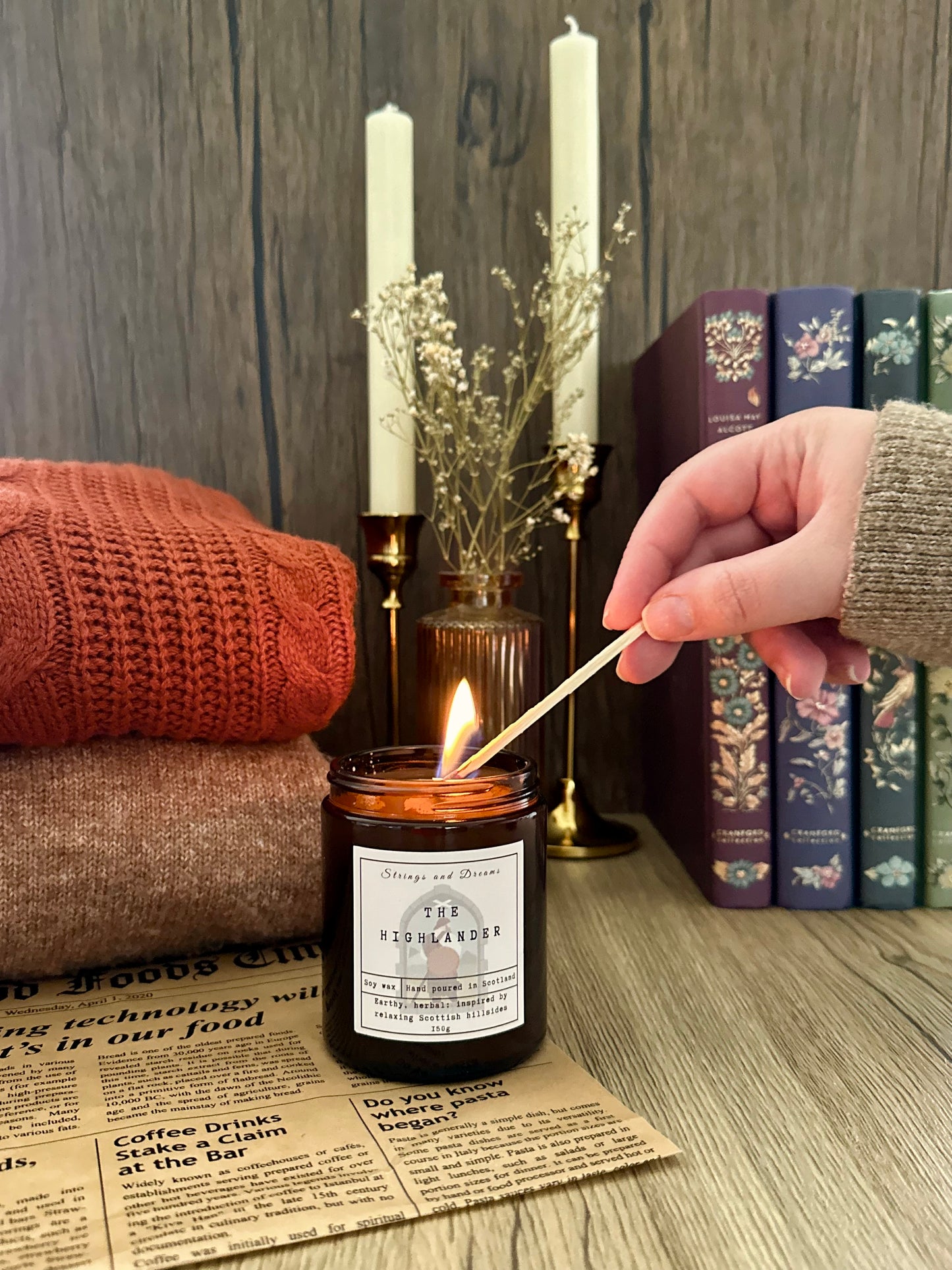 The Highlander digital story scented candle