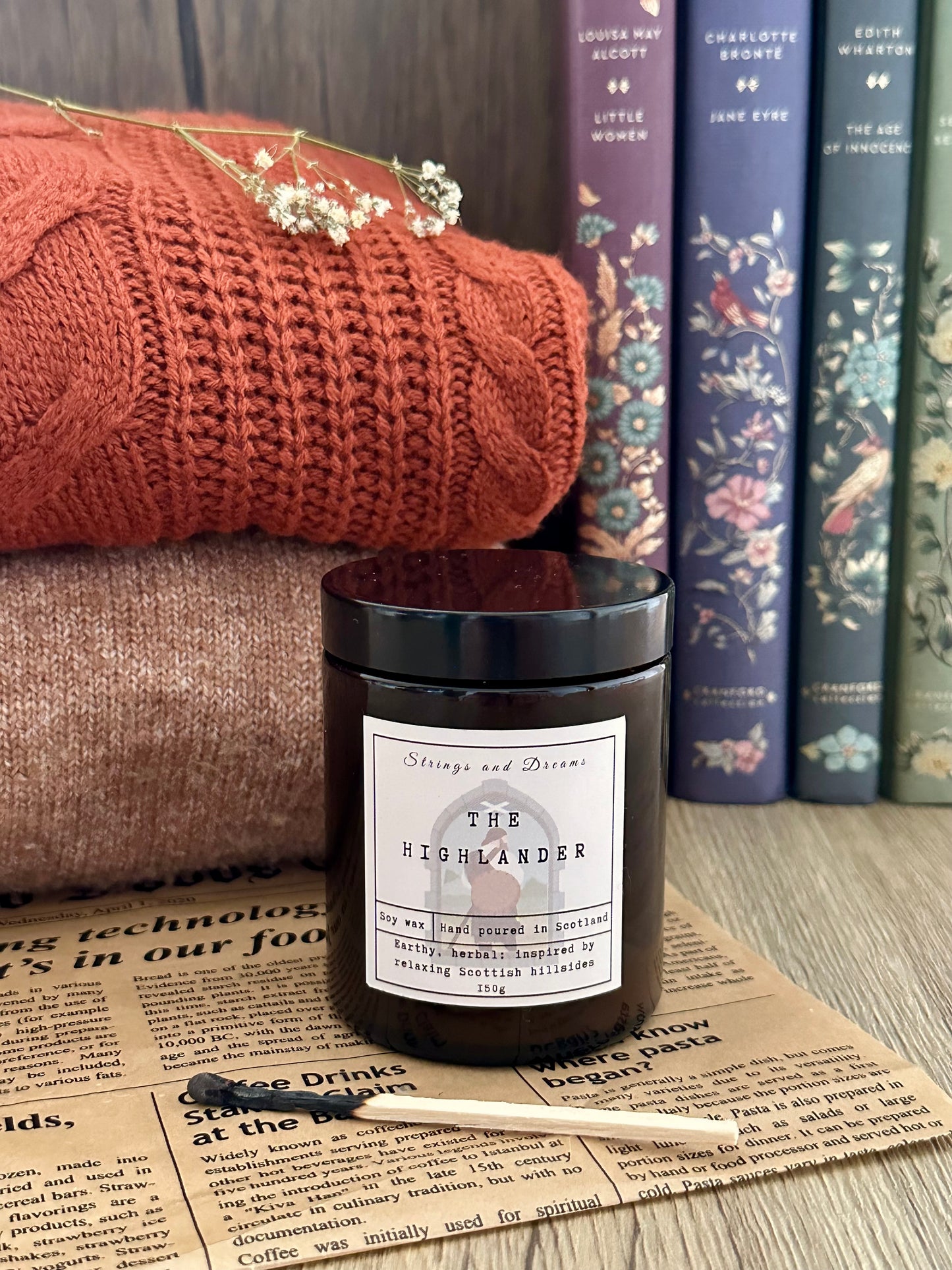 The Highlander digital story scented candle