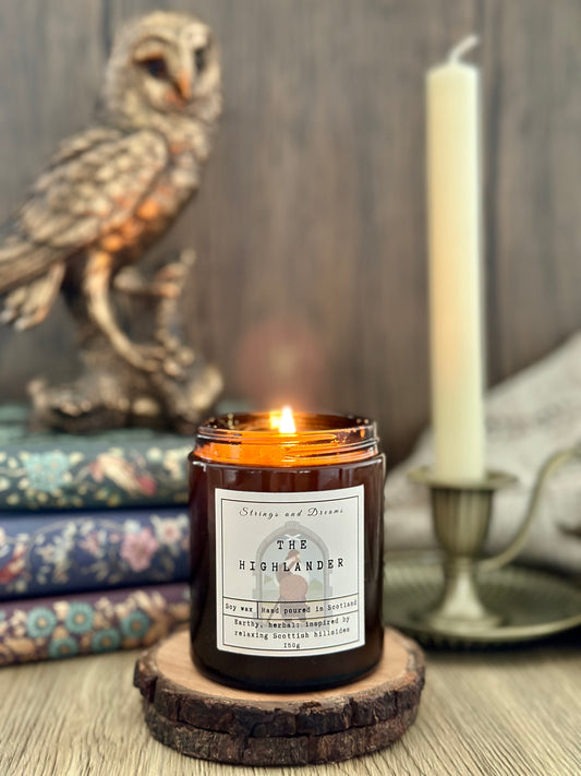 The Highlander digital story scented candle