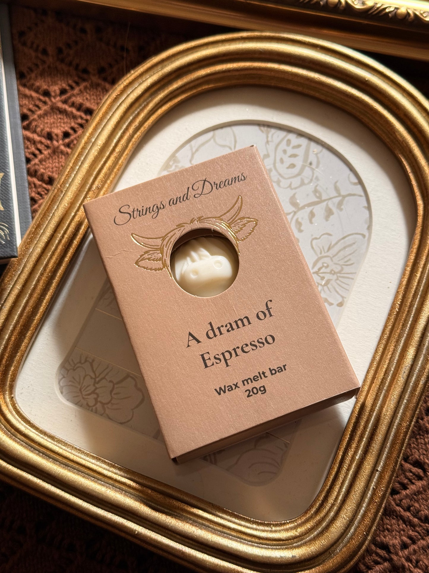 A dram of Espresso Highland Cow wax melt bar