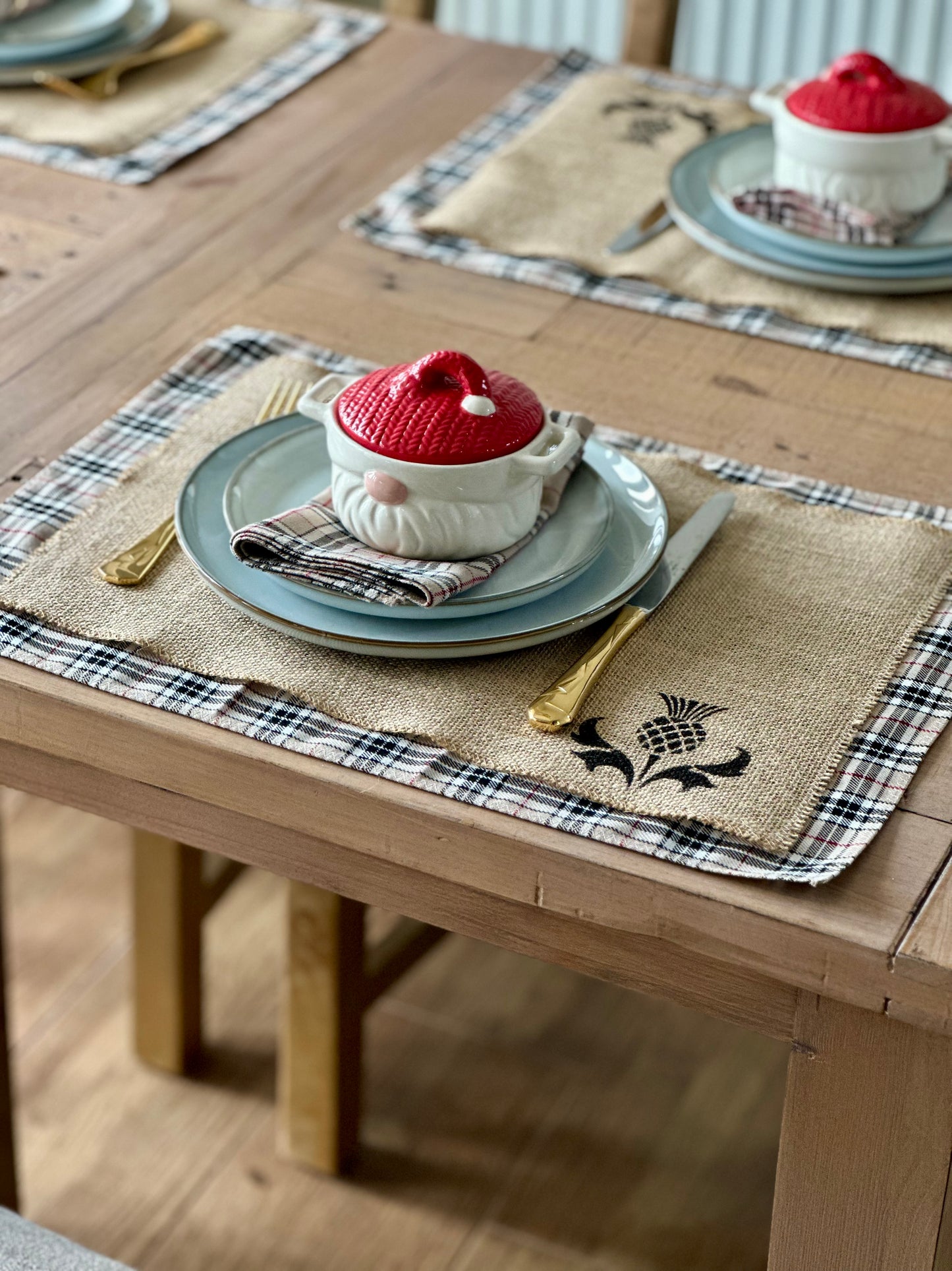 Neutral tartan placemats with thistle