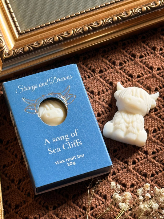 A song of Sea Cliffs Highland Cow wax melt bar