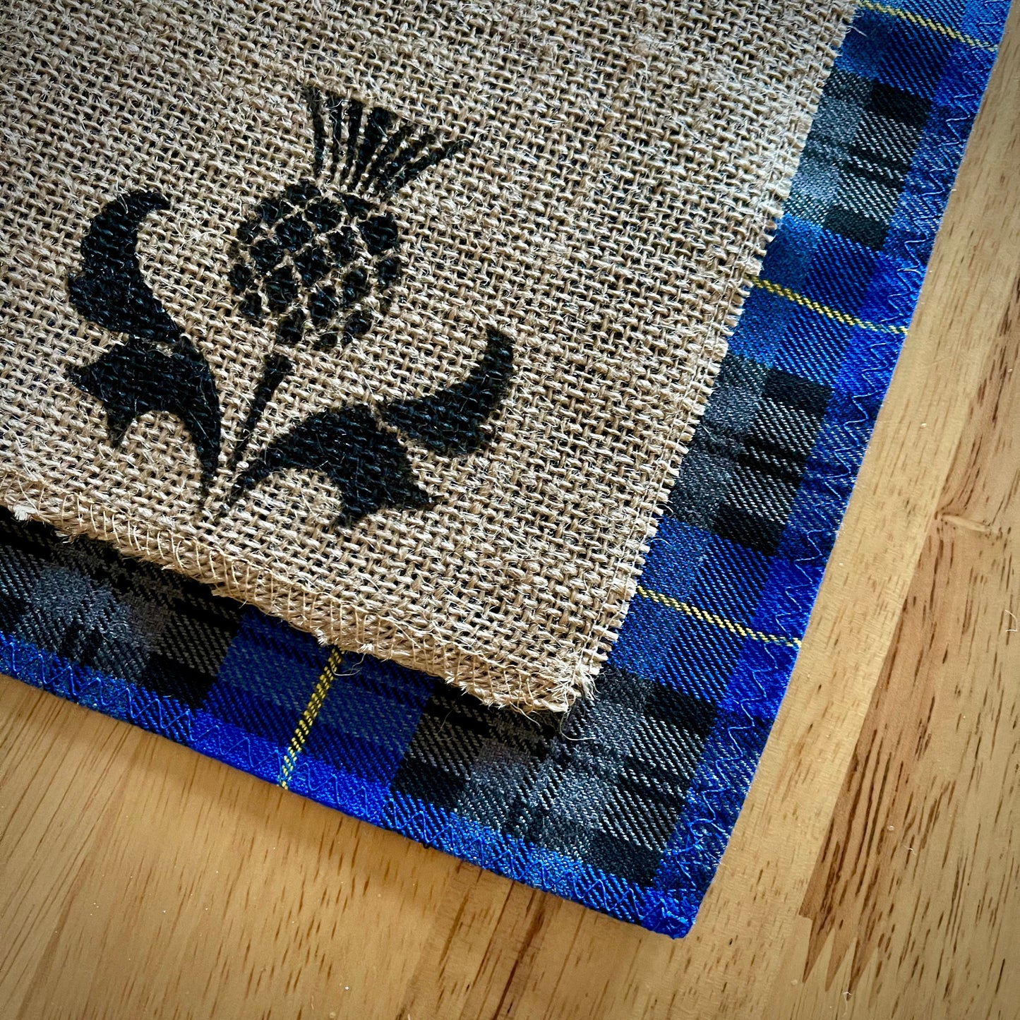 Blue tartan placemats with thistle