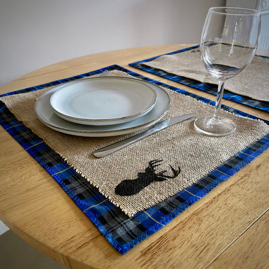 Blue tartan placemats with stag