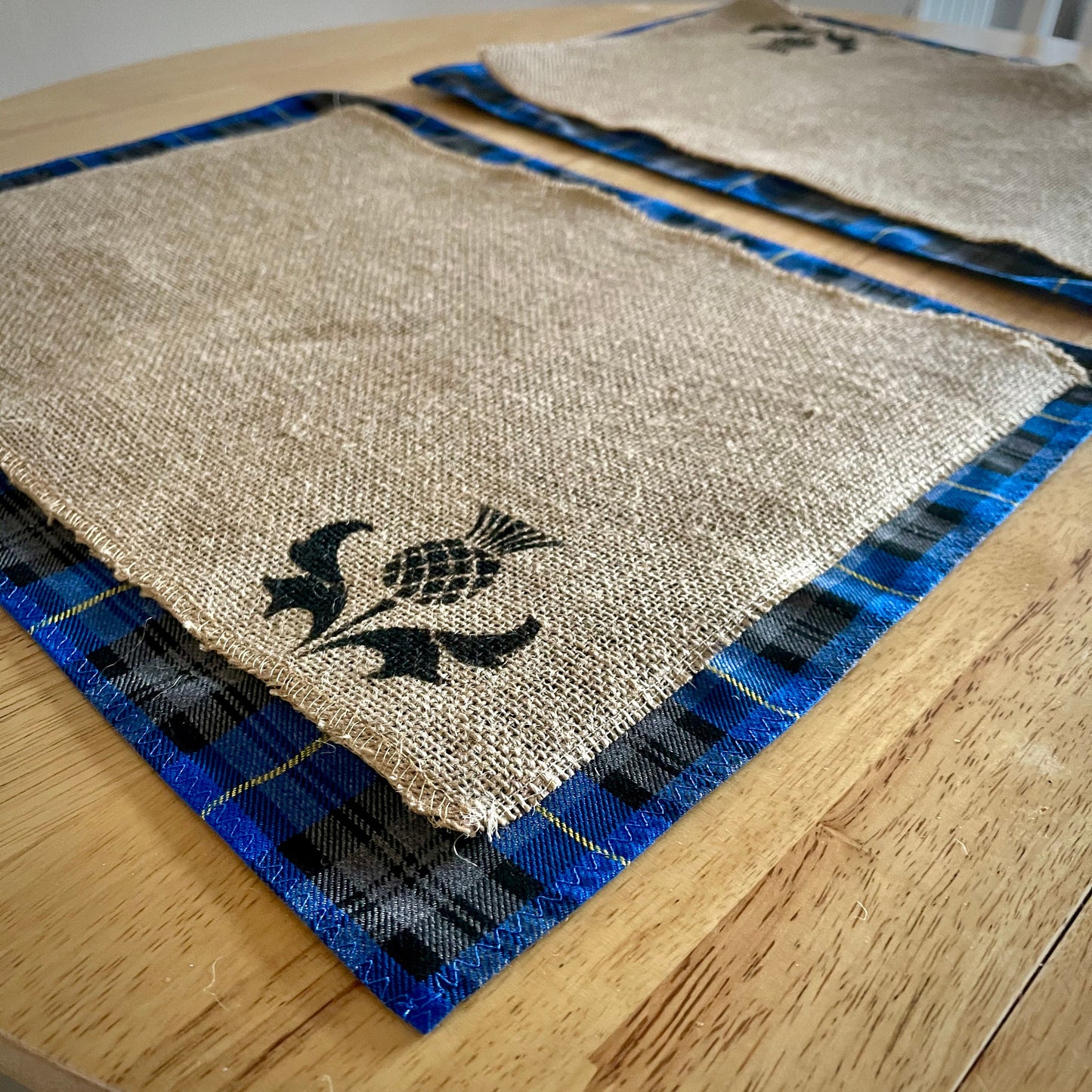 Blue tartan placemats with thistle