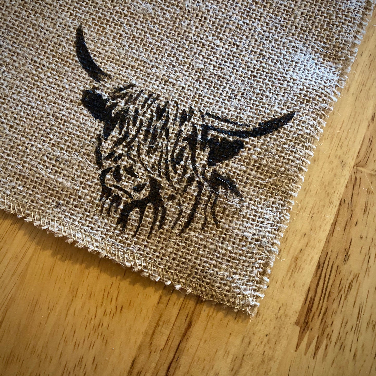 Blue tartan placemats with highland cow