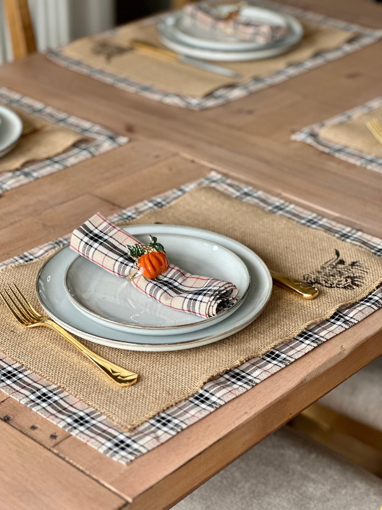 Neutral tartan placemats with highland cow