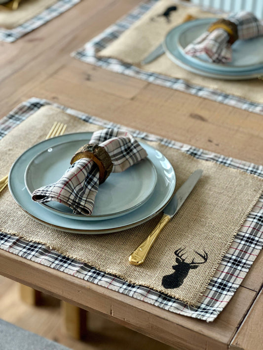 Neutral tartan placemats with stag