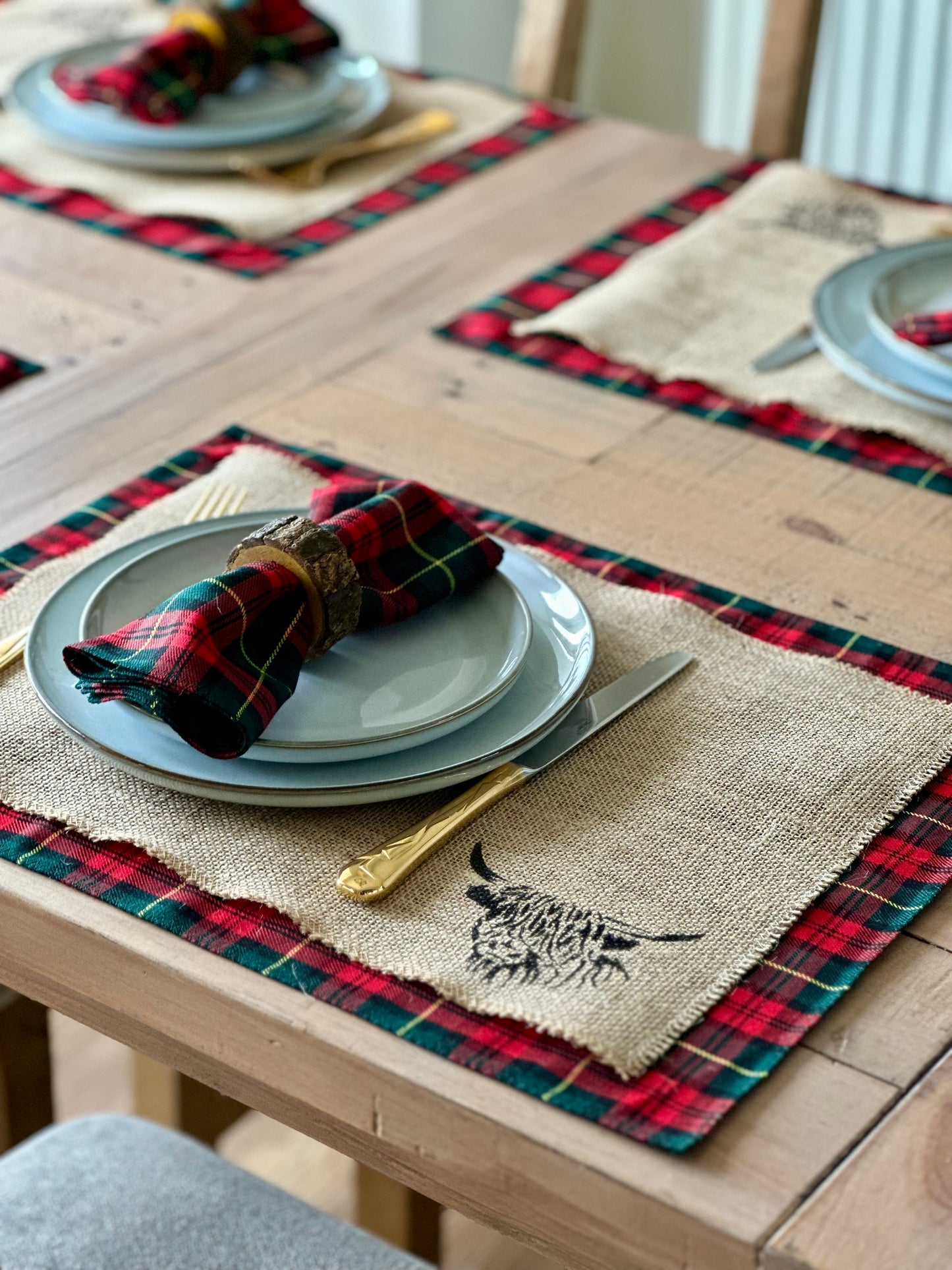 Christmas tartan placemats with highland cow