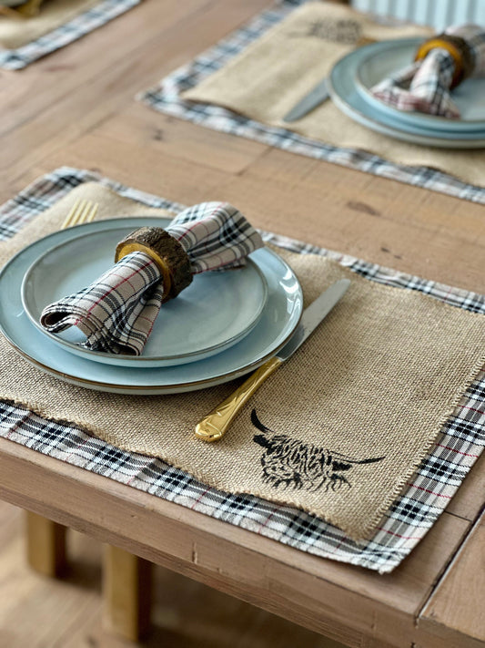 Neutral tartan placemats with highland cow